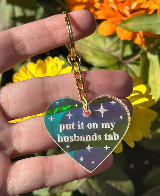 Put It On My Husbands Tab Iridescent Acrylic Keychain