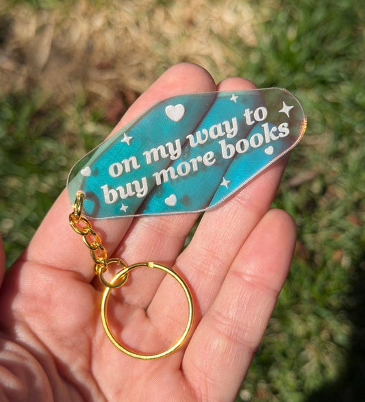 On My Way To Buy More Books Motel Iridescent Keychain